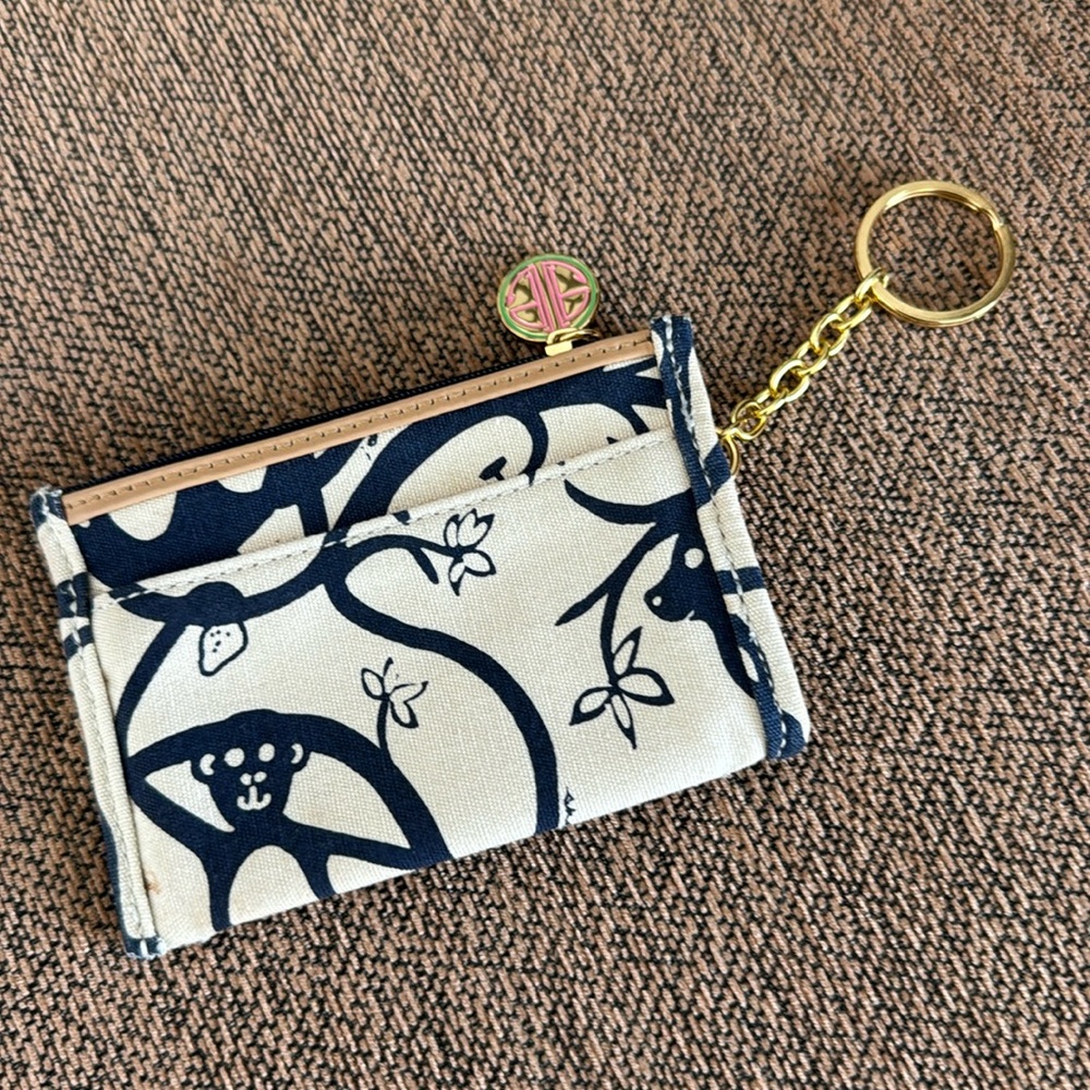 Lilly Pulitzer card wallet with key holder and LP emblem in mint condition.